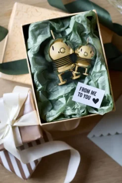 Hoptimist® Wackelfigur Bumble Set XS/S gold