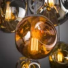 Rubjerg Design Hängeleuchte Stellar 7 Leuchten Glas/Metall altsilber