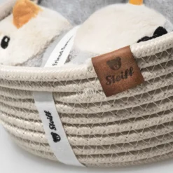 Steiff Geschenkset Lio Pinguin mit Rassel und Latz im Korb