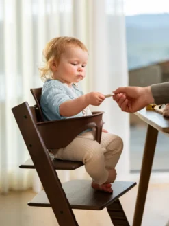 STOKKE® Aktions-Set Tripp Trapp® Eiche warm braun + Babyset warm braun